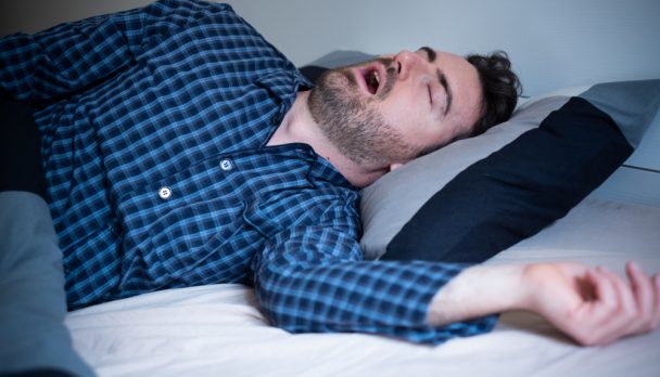 Man,Snoring,And,Suffering,Sahs,At,Night