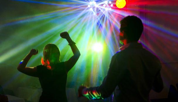 Man,An,Woman,Dancing,Together,On,Party,-,Night,Club